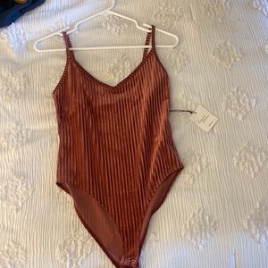 NEVER WORN. Forever 21 velvet body suit